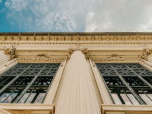 photo looking upward and to the sky of the Illinois Supreme Court building